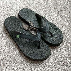 Black Sanuk flip flops